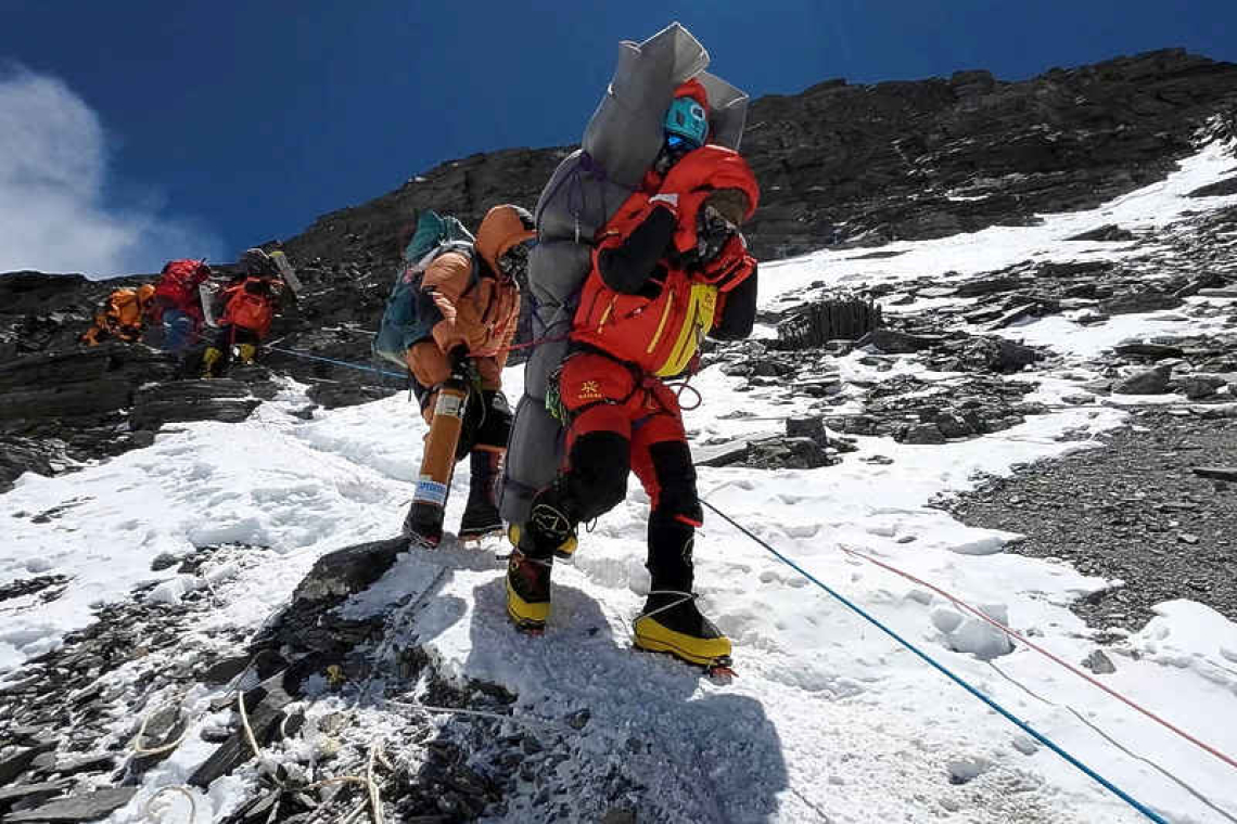 Sherpa saves Malaysian climber in rare Everest death zone rescue 