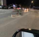 Resident  fills potholes 