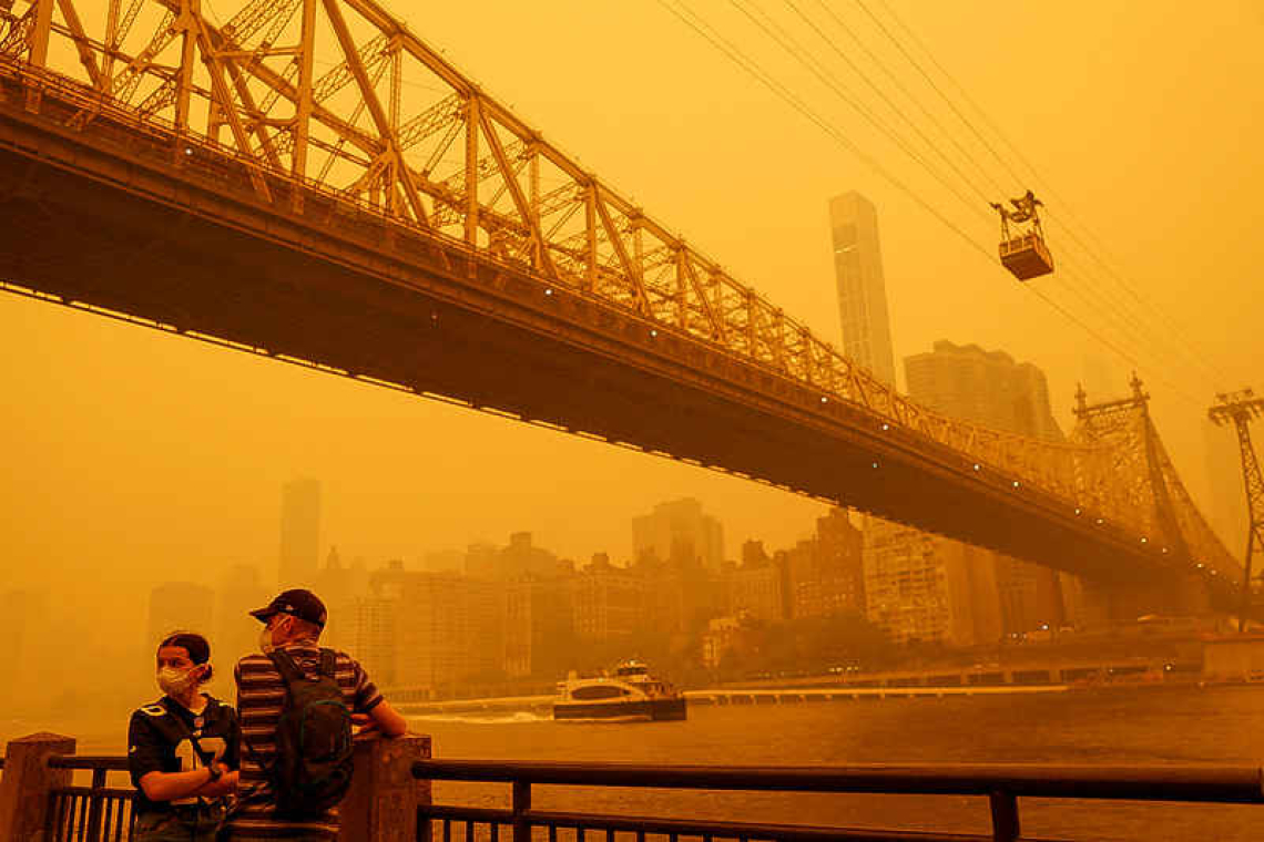US East Coast blanketed in eerie veil of smoke from Canada fires 