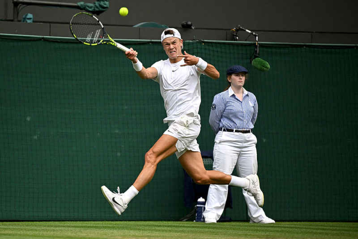 Rune's stature keeps growing as he downs Dimitrov to reach Wimbledon quarters