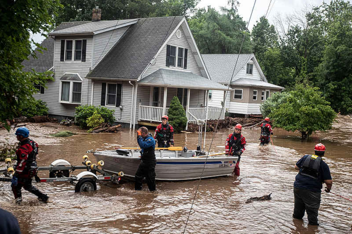 Flash floods rage in Vermont, New York 