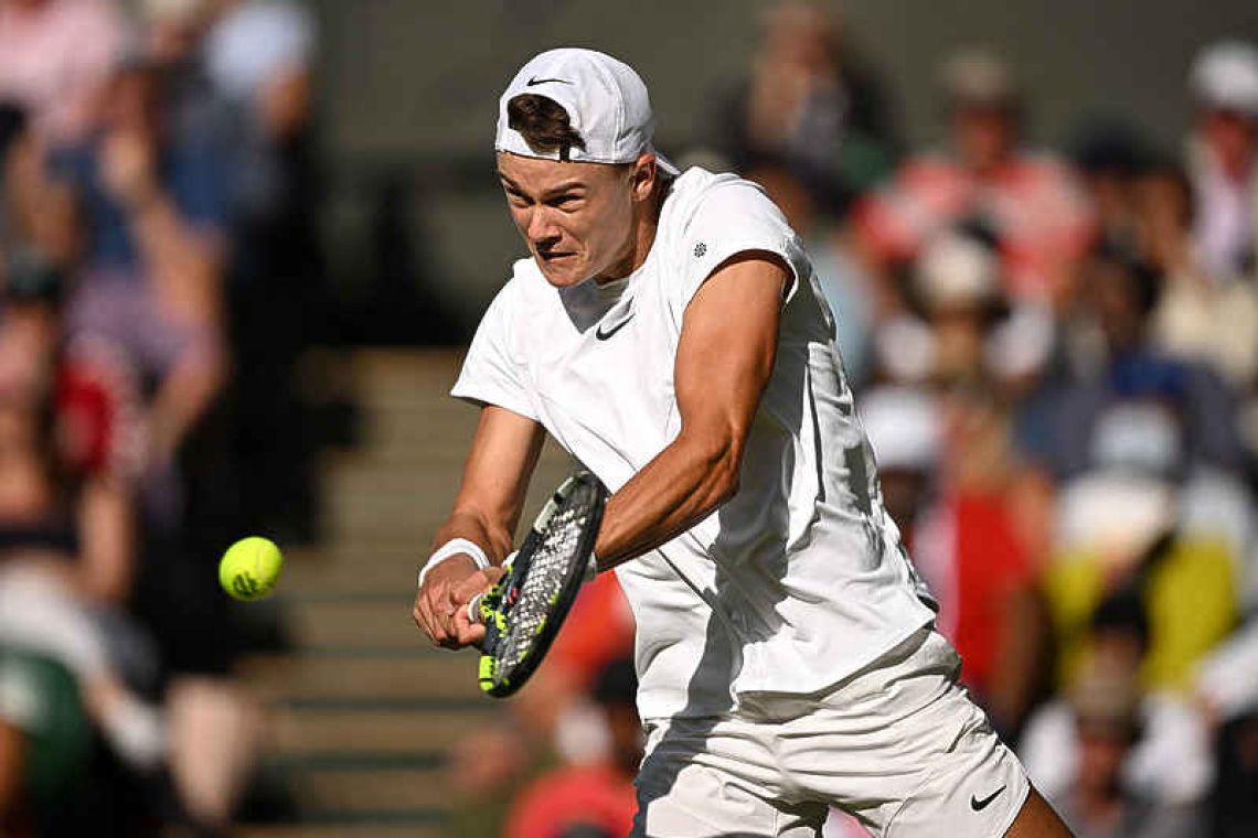 Alcaraz douses Rune fireworks to reach Wimbledon semis for first time 