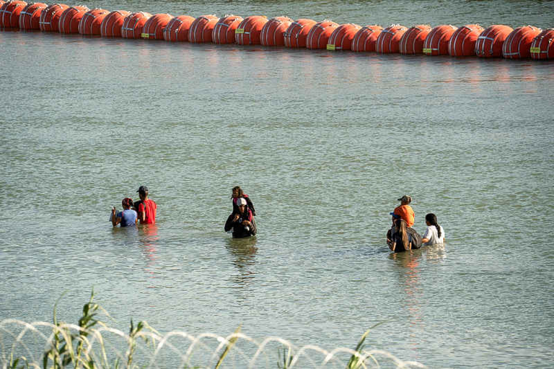 US Justice department sues Texas over new floating border barriers 