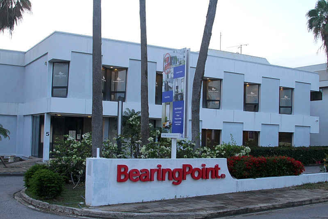 Govt. complies with verdict to pay NAf. 1M  to Bearing Point, considering legal options