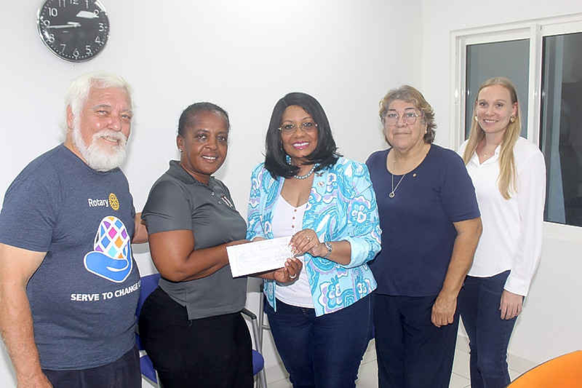 Rotary Club gives funds  for 28 school uniforms