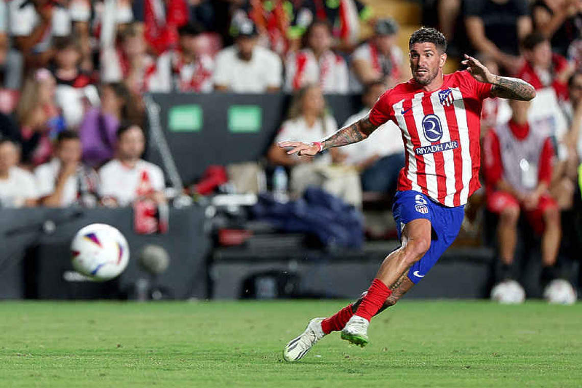 Morata scores twice as Atletico thrash Rayo 7-0 