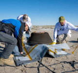 NASA asteroid sample parachutes onto desert