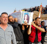 Iraq wedding fire kills more than 100, relatives identify bodies 