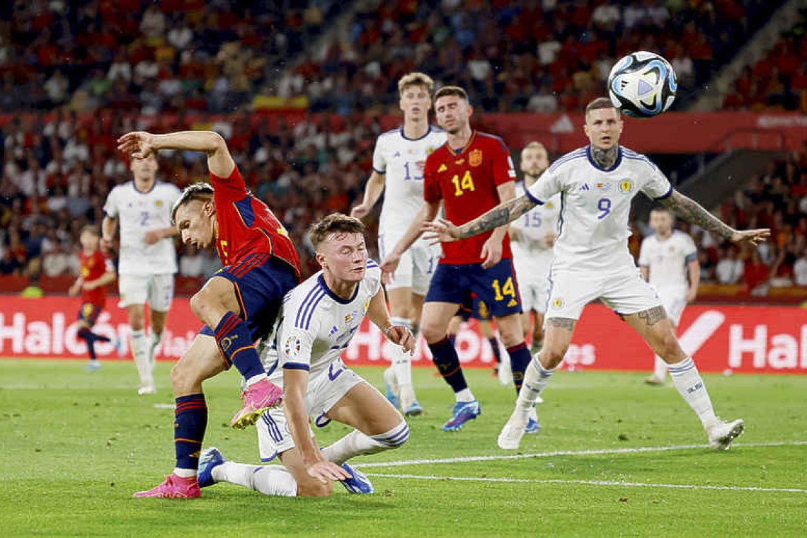 Spain's 2-0 victory leaves champagne on ice for Scotland 