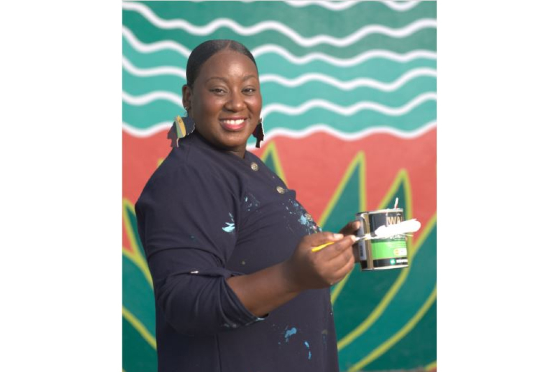 Zillah Duzon Hazel paints mural  for Kooyman Paint Campaign