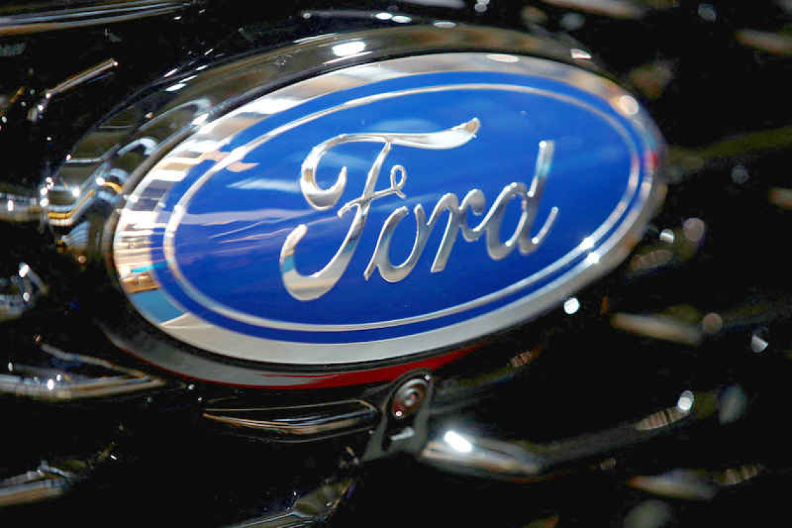UAW leaders approve Ford contract as GM talks drag