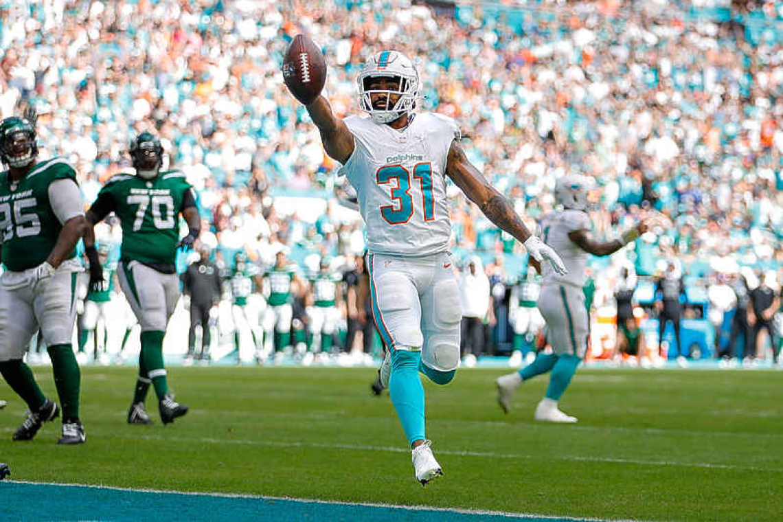 Raheem Mostert sets TD mark as Dolphins blast Jets 