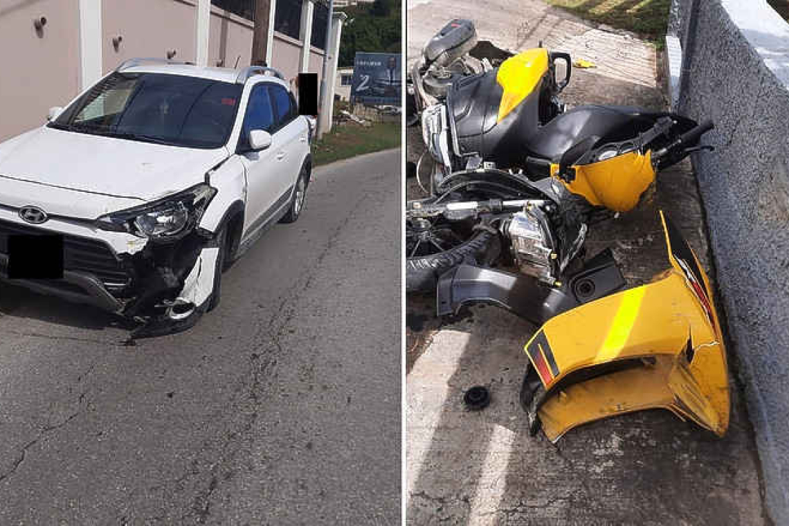 Scooter rider attempts to overtake  vehicles, crashes and breaks his leg