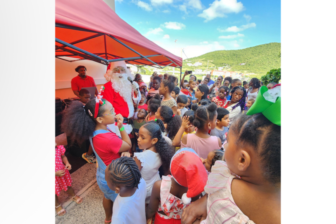 Santa’s elves arrive on motorbikes.  Hundreds of children get gift, spend day