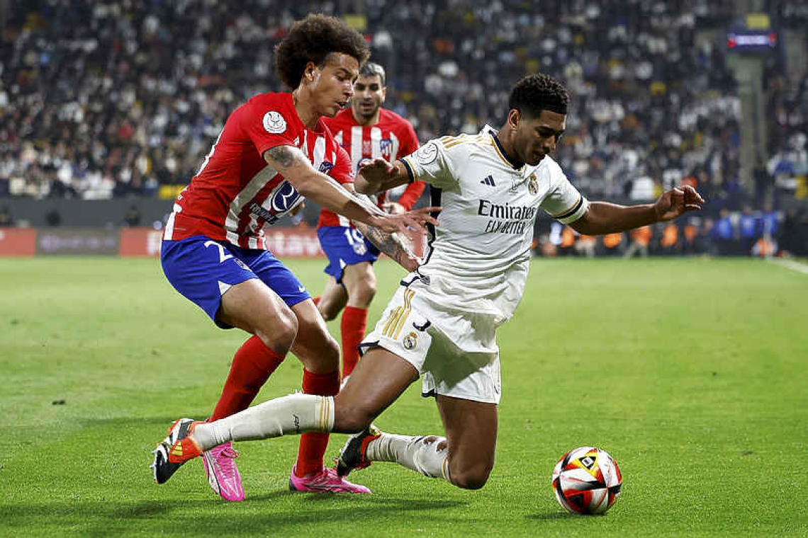 Last-gasp goals earn Real 5-3 win over Atletico 
