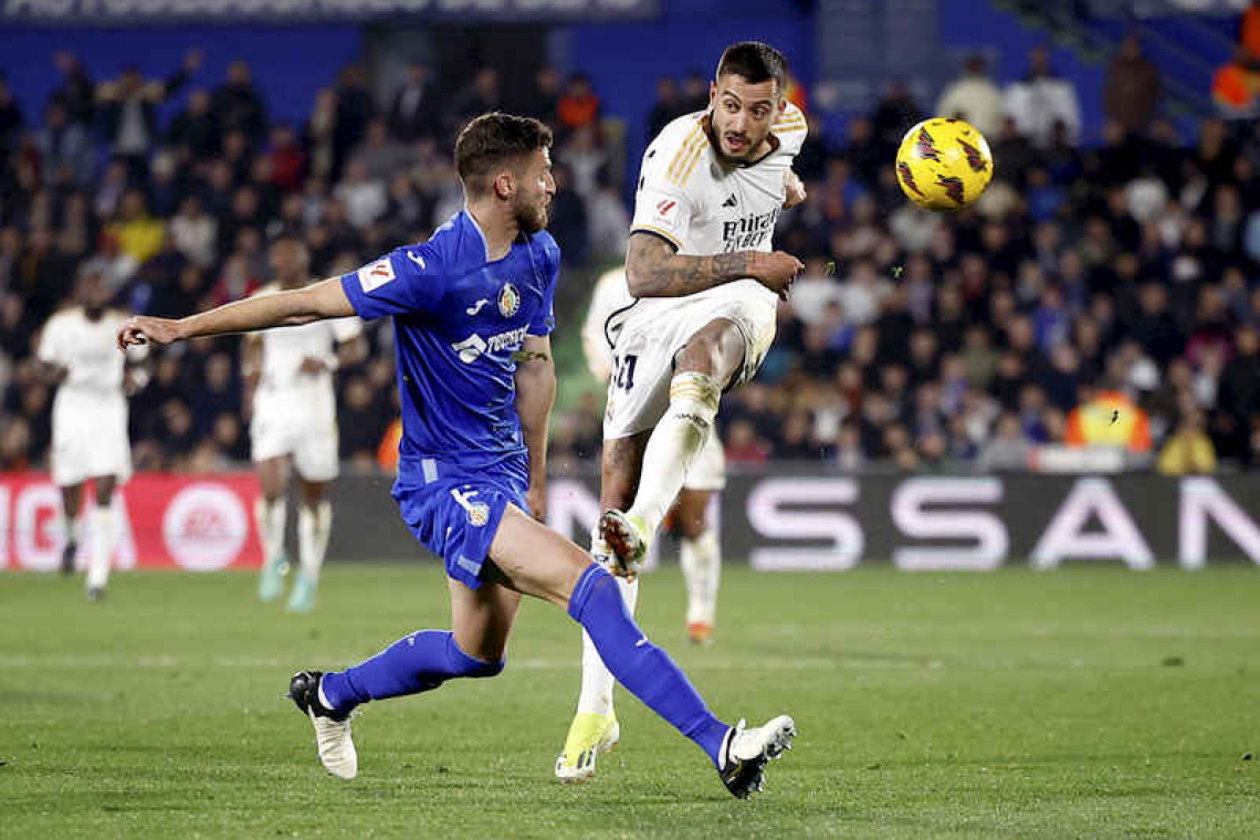 Real Madrid reclaim top spot as Joselu double earns win at Getafe 