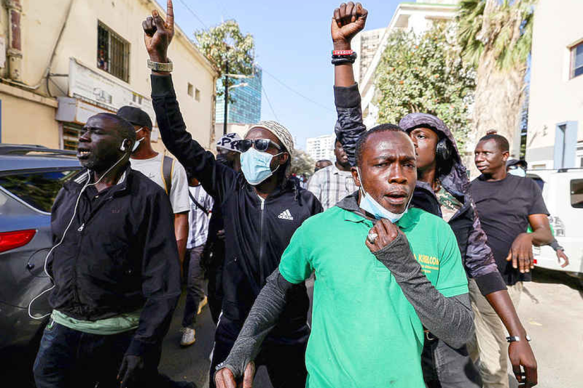 Senegalese lawmakers vote to postpone presidential election to December 15 