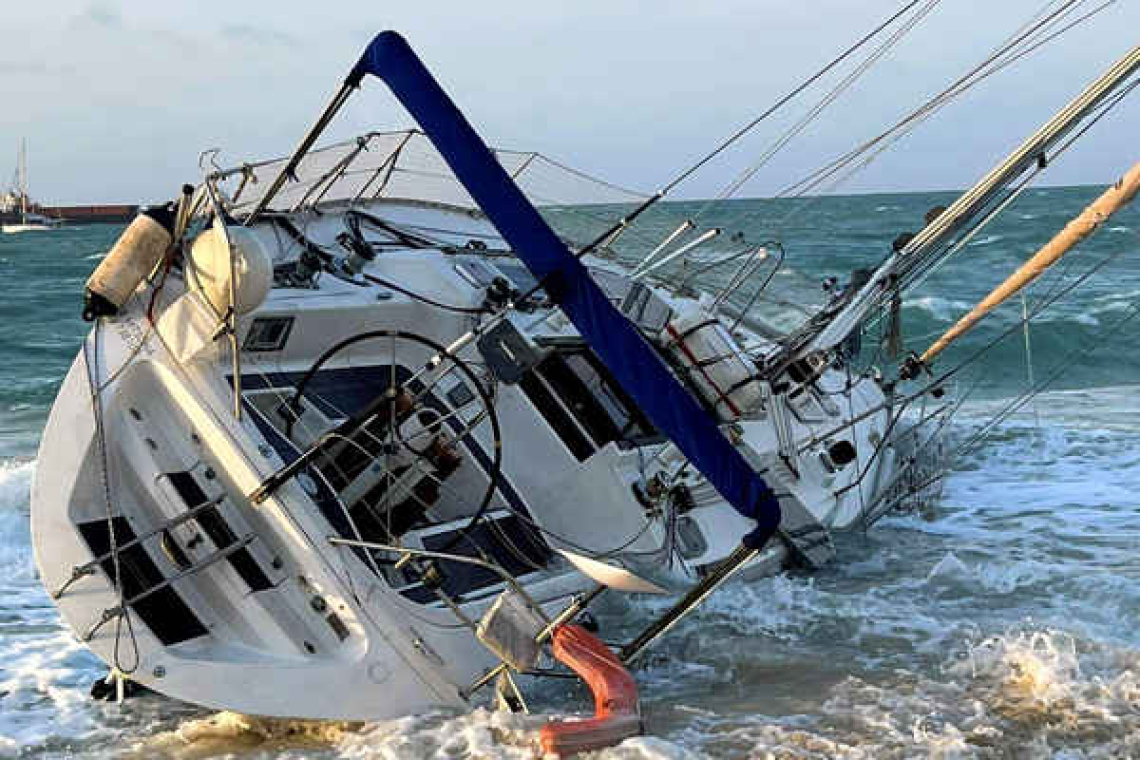 Yacht stranded on Simpson Bay  Beach gifted to a VKS officer
