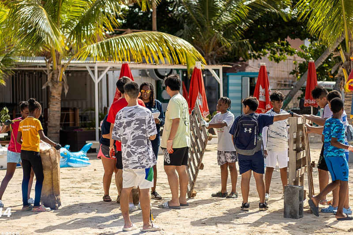 Shores of Change: St. Maarten’s youth lead the charge in 2024 Annual St. Maarten Regatta Beach Clean-up