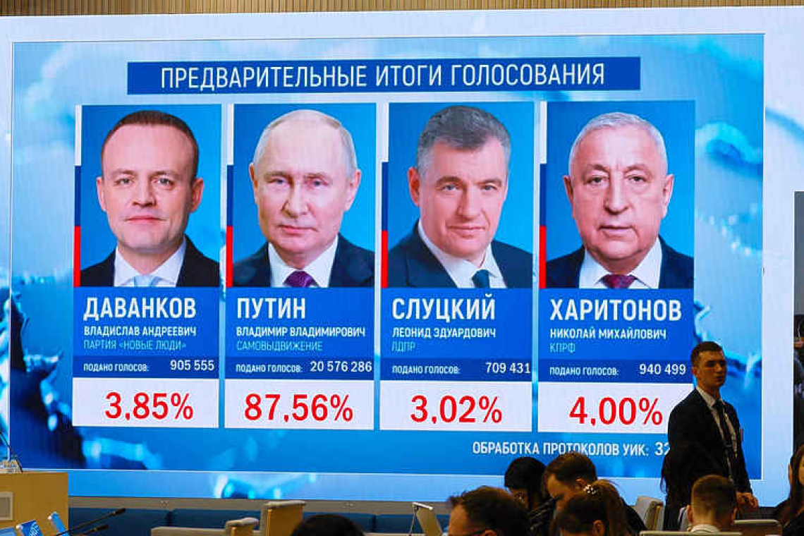 Putin wins election in landslide with no serious competition 