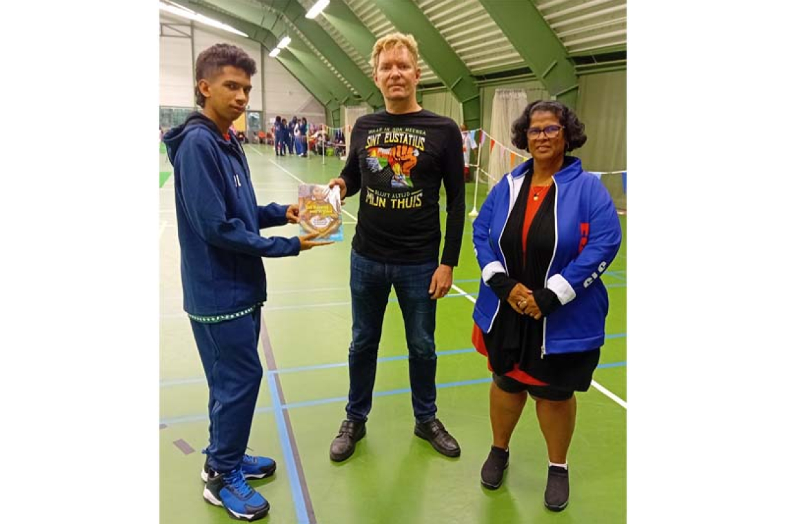 Bocce champion receives  new book about slavery