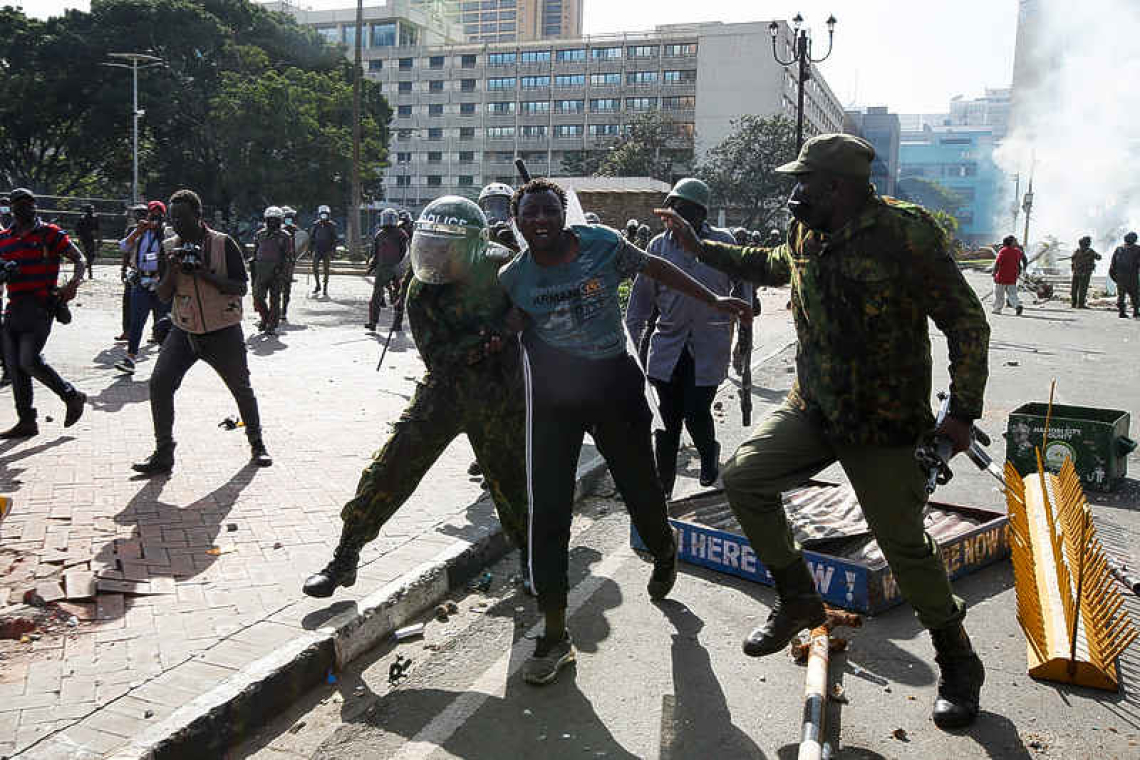 Kenya's president says tax protests 'hijacked' after they turn violent