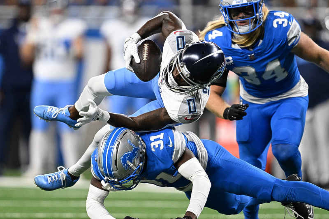 Lions eclipse 50-point mark for first time since 1997, trounce Titans