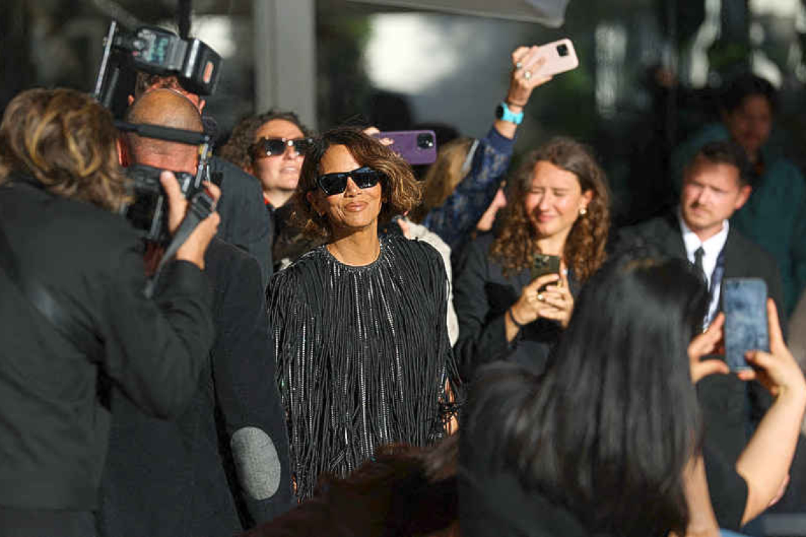 Stars strive to dispel tariff  gloom at Cannes festival