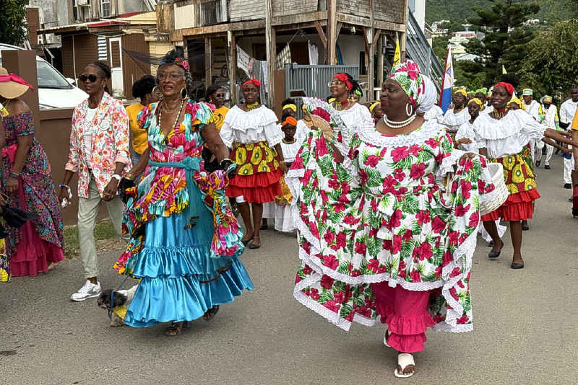 Colourful frocks make a splash at the  Abolition of Slavery commemoration