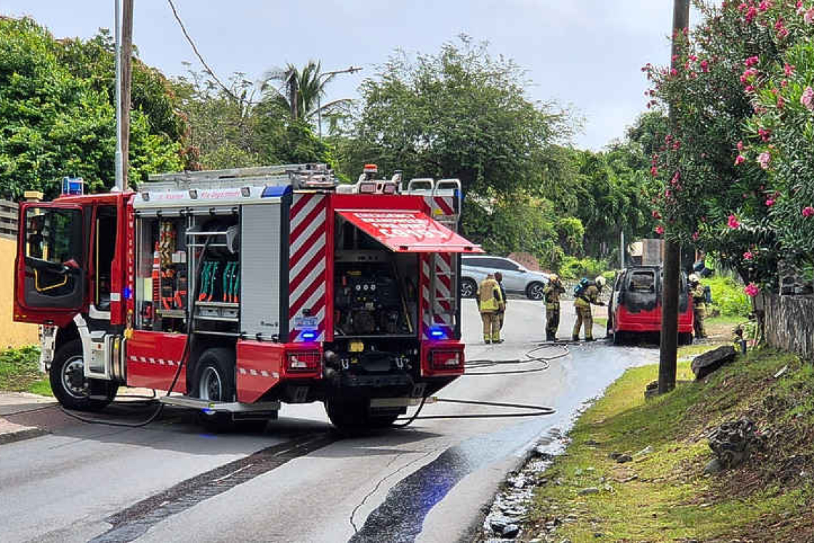 Passenger van catches fire  on A.Th. Illidge Road