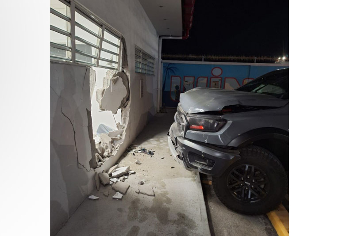 Truck crashes into Winair building,  driver absent when police arrive