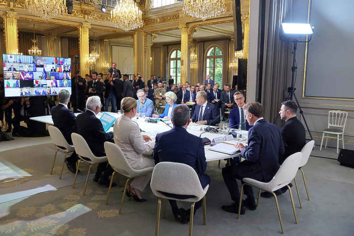 Macron: 26 nations vow to give Ukraine postwar security guarantees 