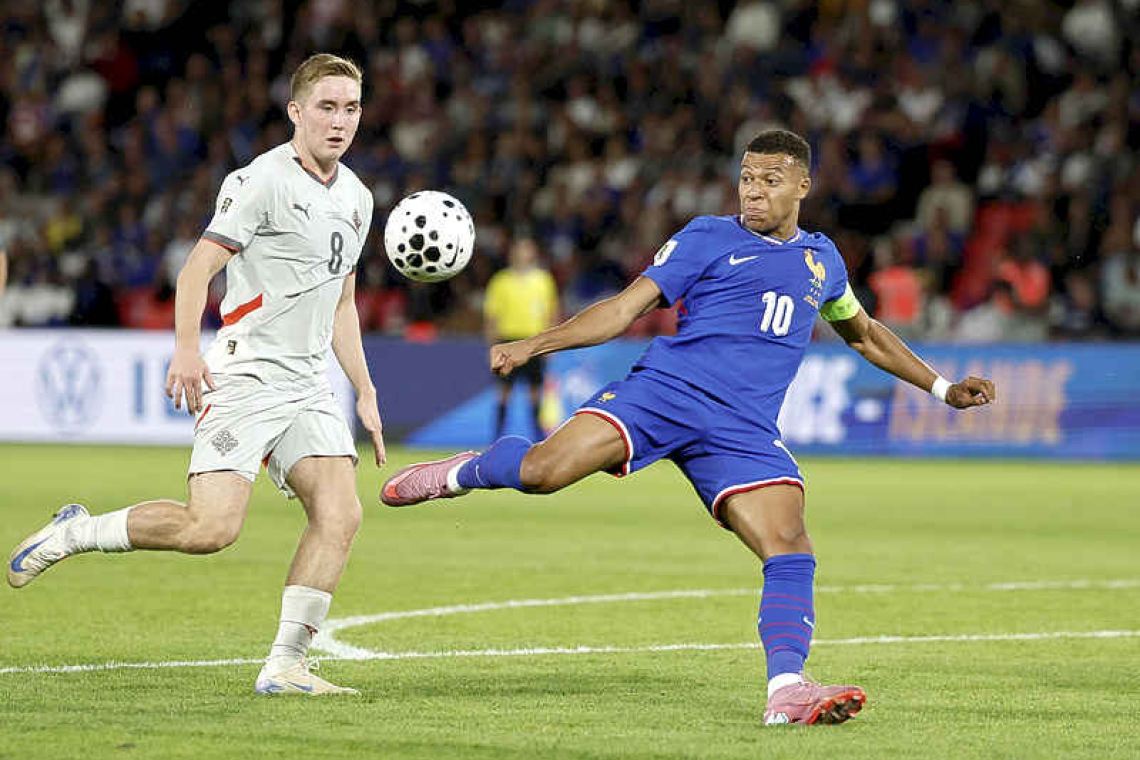    Mbappe on the spot as France beat Iceland 2-1 in World Cup qualifier     