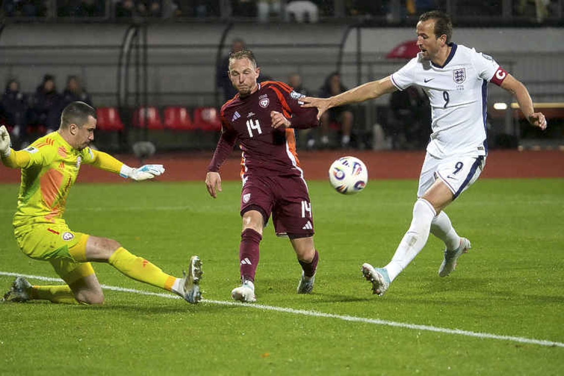 England thrash Latvia to qualify for World Cup finals