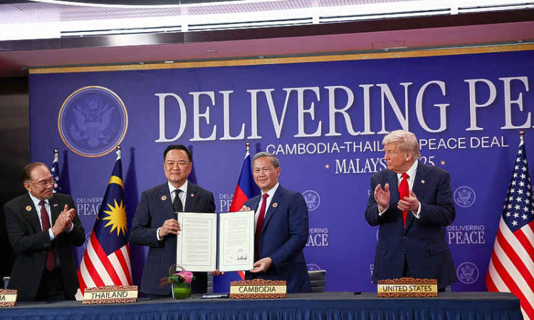 Trump oversees truce signing and  trade deal flurry on first Asian stop
