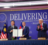 Trump oversees truce signing and  trade deal flurry on first Asian stop