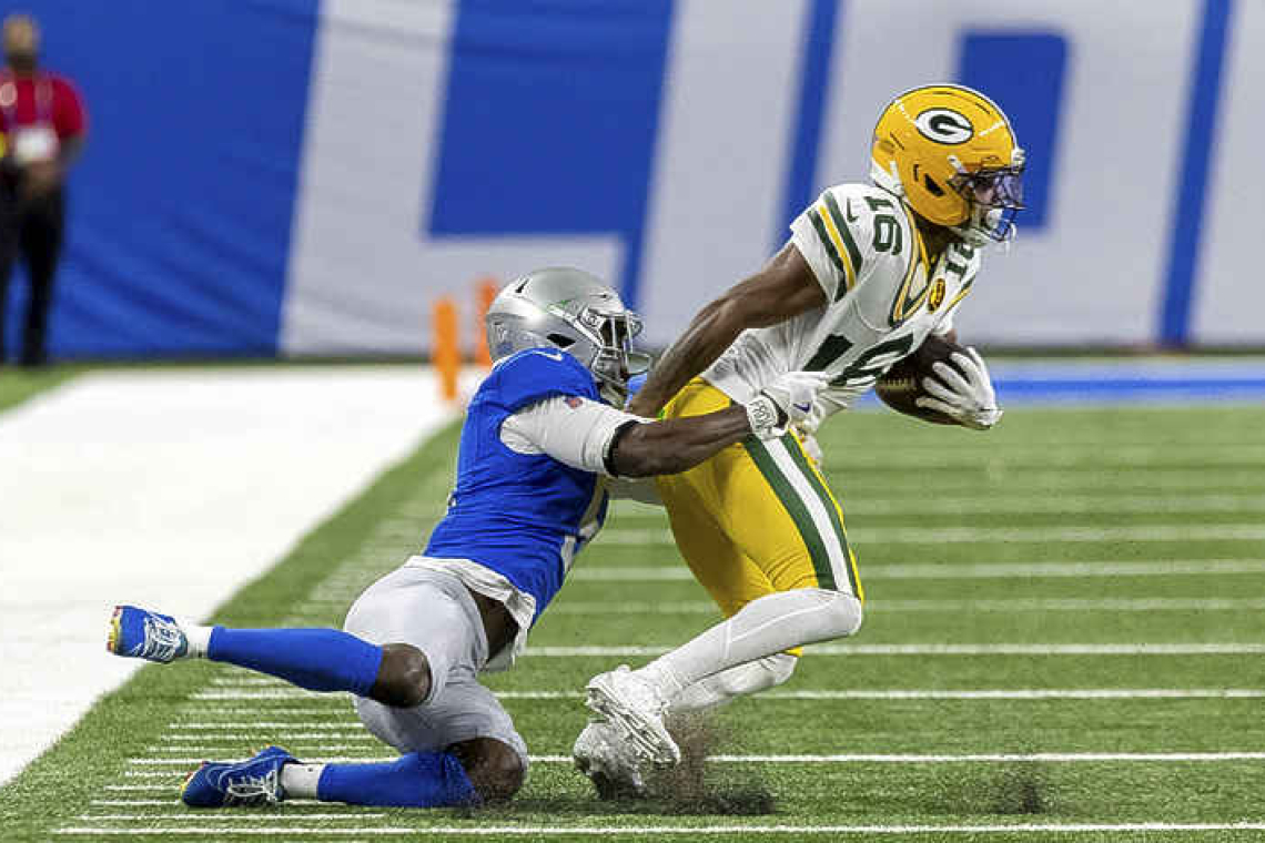Jordan Love throws four TD passes, leads Packers over Lions