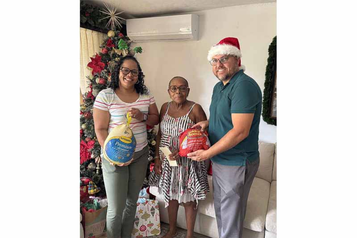 MP Wever gives hams, turkeys,  vouchers to families for Xmas