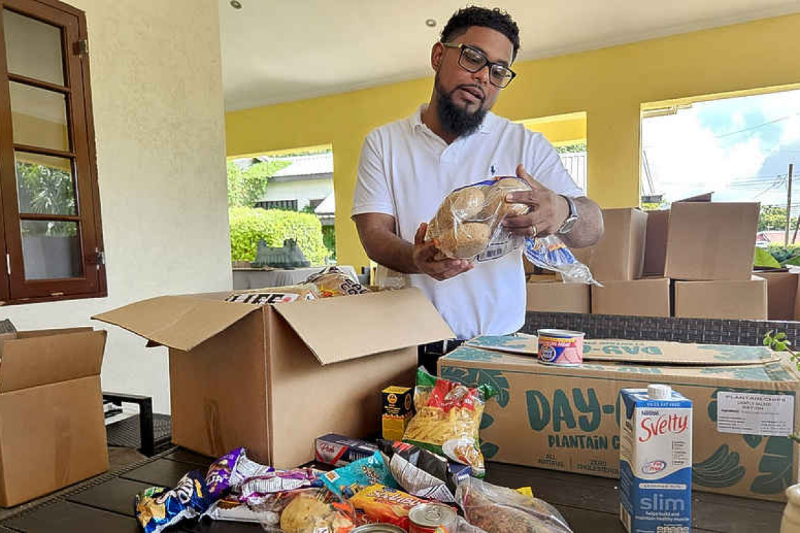 Philanthropist spreads Christmas  cheer with almost 200 hampers