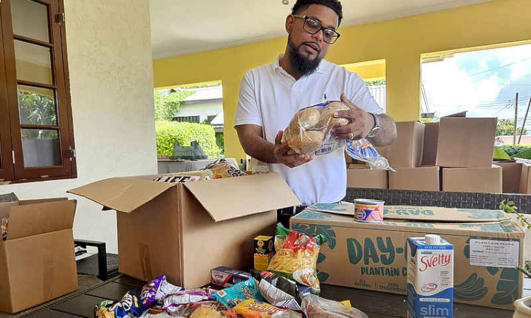 Philanthropist spreads Christmas  cheer with almost 200 hampers