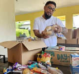 Philanthropist spreads Christmas  cheer with almost 200 hampers