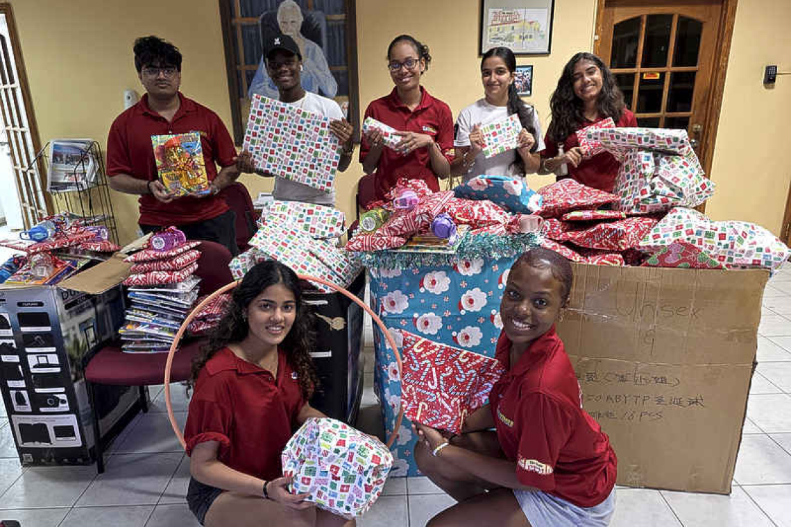 Teen Times delivers wrapped gifts and  school supplies to Leaders for Change