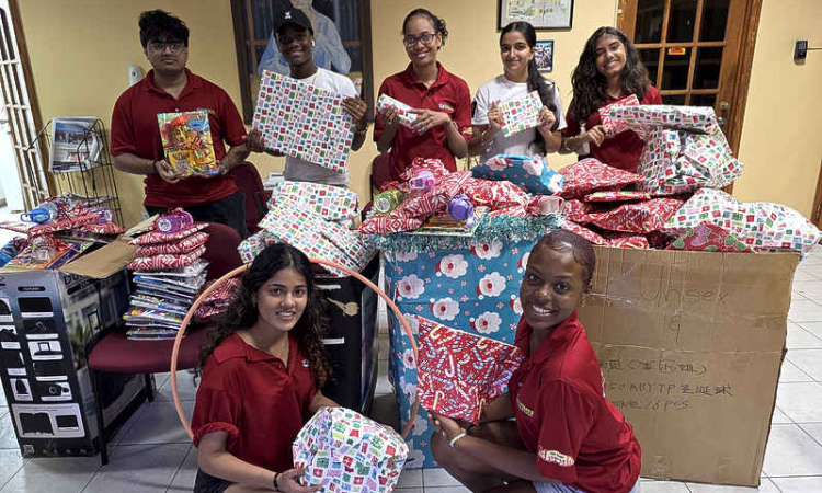 Teen Times delivers wrapped gifts and  school supplies to Leaders for Change