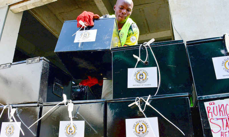 Uganda opposition candidate vows he will  review all oil deals if elected next week