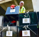 Uganda opposition candidate vows he will  review all oil deals if elected next week