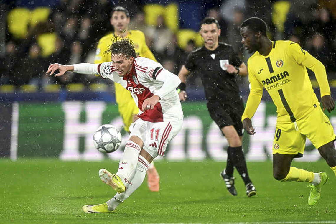 Ajax defy rain in Spain to book second Champions League win