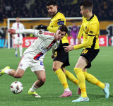 Sancho sends Villa through as Lyon and Freiburg also advance to Europa last 16