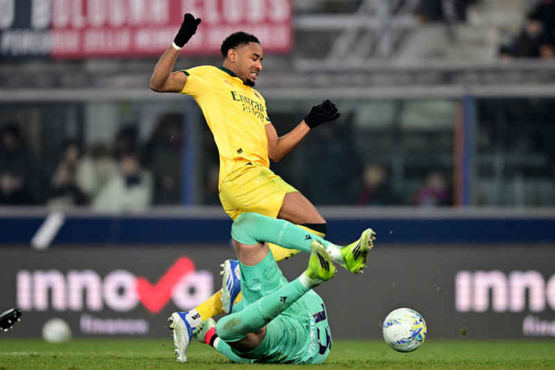 AC Milan close gap on city rivals Inter after 3-0 win at Bologna