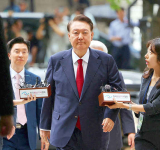 South Korean court hands life in prison  to ex‑President Yoon for insurrection