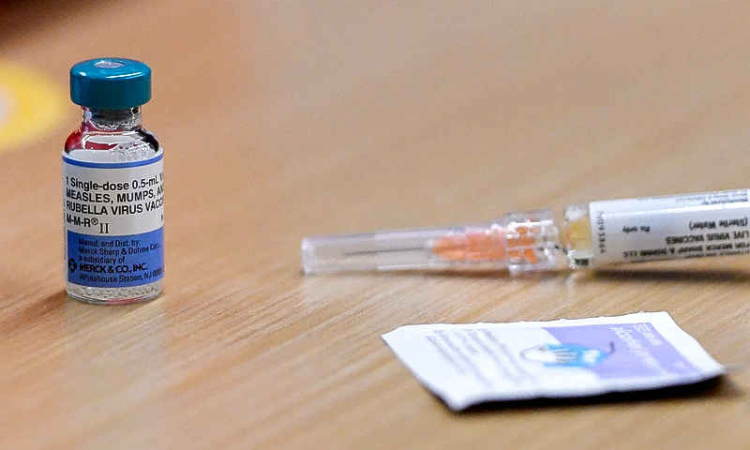 Americans trust vaccines, school mandates,  rejecting Trump agenda, Reuters poll finds